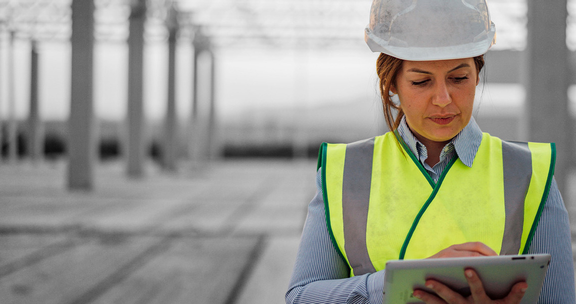 image of a male and female construction project  manager on site